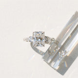 White gold Three-Stone Radiant Cut Diamond Ring with Pear Side Stones in Four-Prong Setting_191