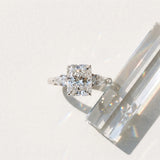 Silver Three-Stone 2.09 Carat F VS1 Radiant Diamond Ring with Pear Side Stones in Four-Prong Setting