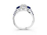 White gold Three-Stone Radiant Cut Diamond Ring with Round with Blue Sapphire side stone Pavé Band and Prong Setting_15