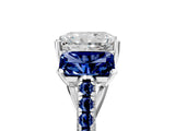 White gold Three-Stone Radiant Cut Diamond Ring with Round with Blue Sapphire side stone Pavé Band and Prong Setting_17