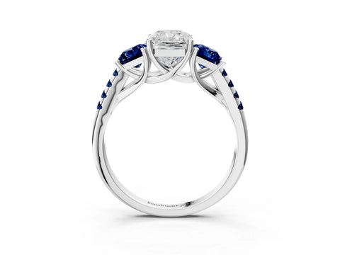 White gold Three-Stone Radiant Cut Diamond Ring with Round with Blue Sapphire side stone Pavé Band and Prong Setting_3