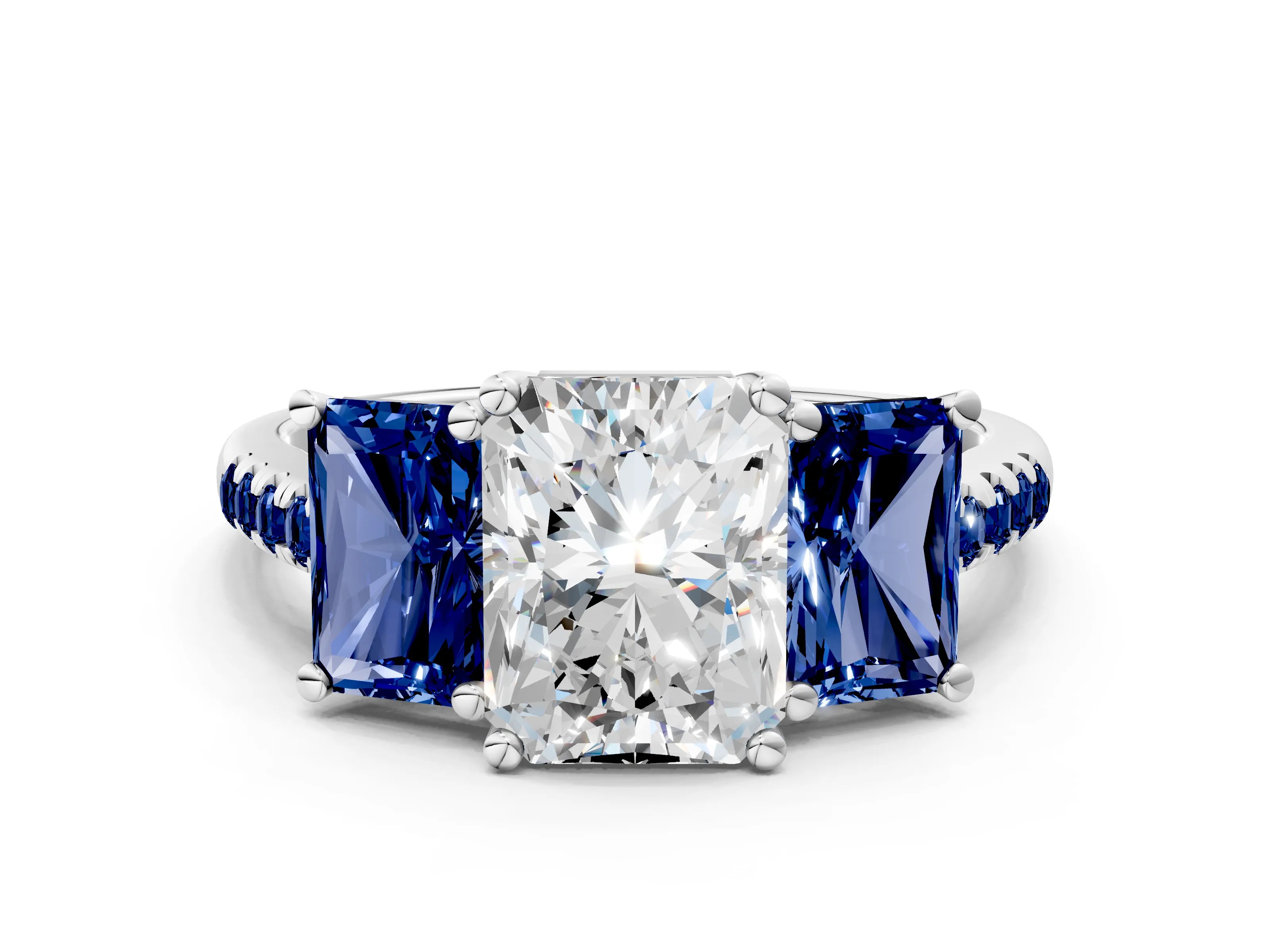 White gold Three-Stone Radiant Cut Diamond Ring with Round with Blue Sapphire side stone Pavé Band and Prong Setting