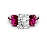 White gold Three-Stone Radiant Cut Diamond Ring with Round with Garnet side stone Pavé Band and Prong Setting