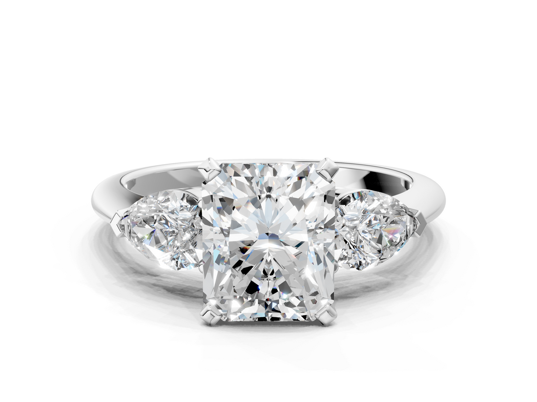 White gold Three-Stone Radiant Diamond Ring with Pear Side Stones in Four-Prong Setting_111