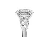 White gold Three-Stone Radiant Diamond Ring with Pear Side Stones in Four-Prong Setting_116