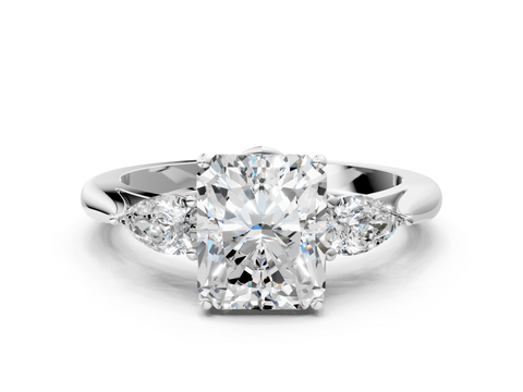 White gold Three-Stone Radiant Diamond Solitaire Ring with Pear Side Stones and Four-Prong Setting_45