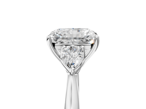 White gold Three-Stone Radiant Diamond Solitaire Ring with Pear Side Stones and Four-Prong Setting_50