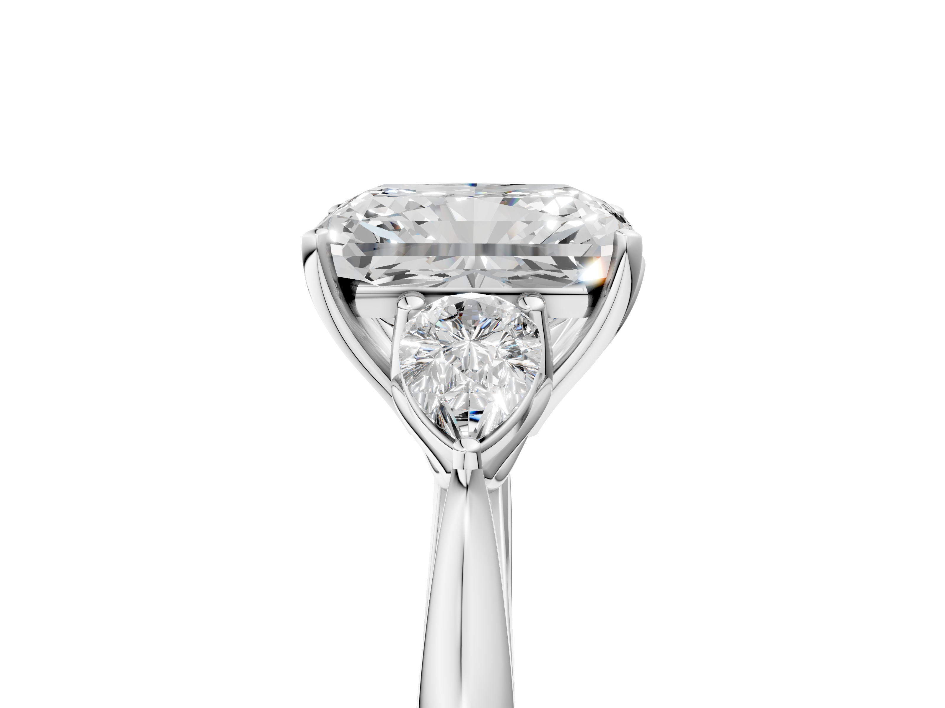 White gold Three-Stone Radiant Diamond Solitaire Ring with Pear Side Stones and Four-Prong Setting_50