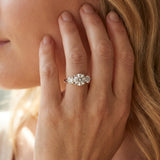 White gold Three-Stone Round Brilliant Cut Solitaire Ring with Prong Setting on a Classic Band_68