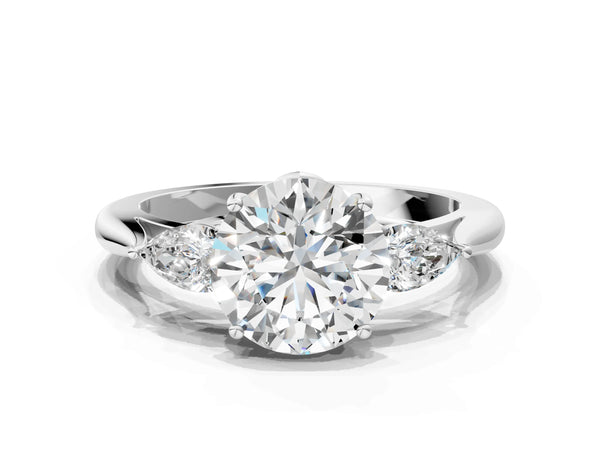 White gold Three-Stone Round Brilliant Diamond Solitaire Ring with Tapered Band and Four-Prong Setting
