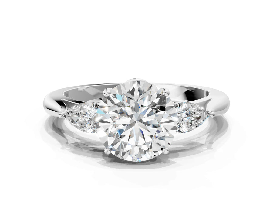 White gold Three-Stone Round Brilliant Diamond Solitaire Ring with Tapered Band and Four-Prong Setting