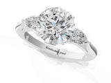 White gold Three-Stone Round Brilliant Diamond Solitaire Ring with Tapered Band and Four-Prong Setting_69