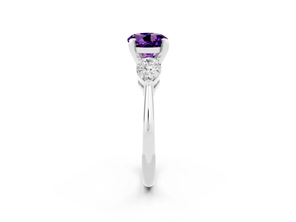 Silver Three-Stone Round Cut Amethyst Ring with Pear Side Stones and Four-Prong Setting