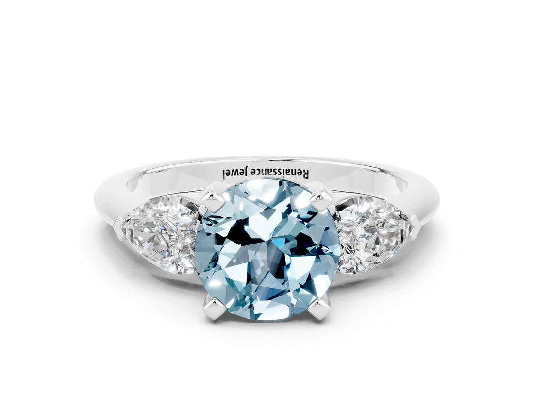 White gold Three-Stone Round Cut Aquamarine Ring with Pear Side Stones and Four-Prong Setting_24