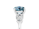 White gold Three-Stone Round Cut Aquamarine Ring with Pear Side Stones and Four-Prong Setting_29