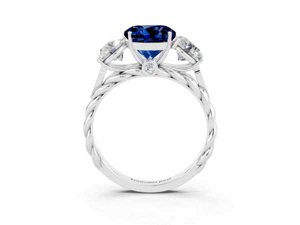 Platinum Three-Stone Round Cut Blue Sapphire Braided Band Ring with Four-Prong Setting