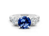 White gold Three-Stone Round Cut Blue Sapphire Pavé Band with Four-Prong Setting