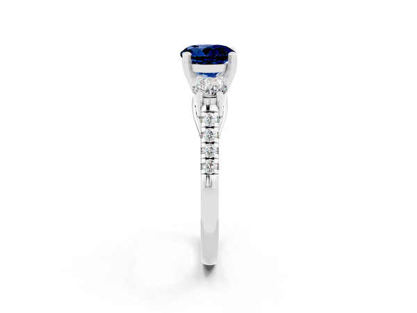 Platinum Three-Stone Round Cut Blue Sapphire Pavé Band with Four-Prong Setting