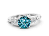 White gold Three-Stone Round Cut Blue Topaz Ring with Pear  Side Stones in Four-Prong Setting_12