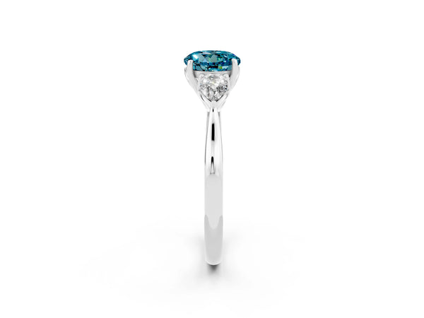 Platinum Three-Stone Round Cut Blue Topaz Ring with Pear  Side Stones in Four-Prong Setting