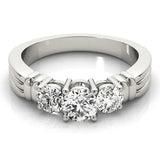 White gold Three-Stone Round Cut Channel Set Diamond Ring with Four-Prong Setting 1
