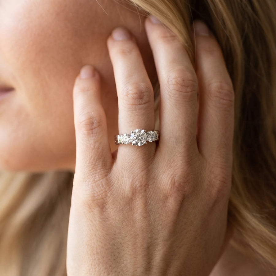 White gold Three-Stone Round Cut Channel Set Diamond Ring with Four-Prong Setting