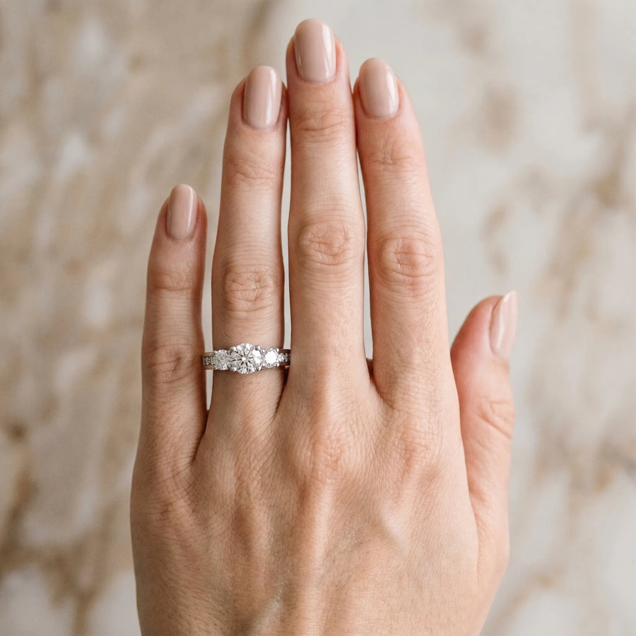 White gold Three-Stone Round Cut Channel-Set Diamond Ring with Prong Setting