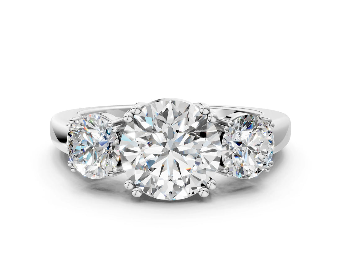 14K White Gold Three-Stone 3.09 Carat D VVS1 Round Cut Diamond Ring with Channel Set Band and Four-Prong Setting
