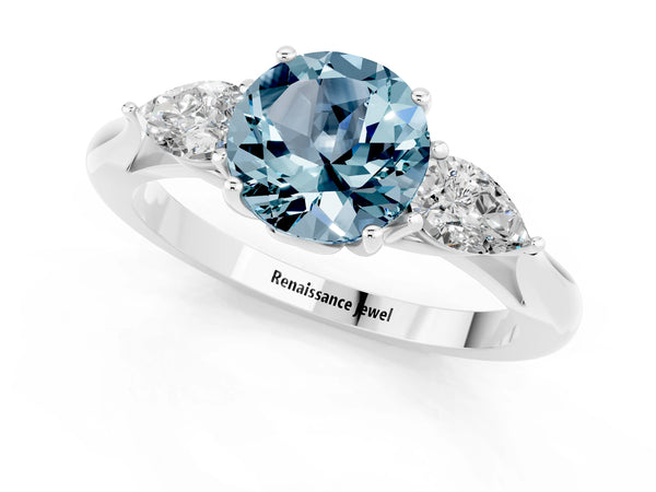 Silver Three-Stone Round Cut Aquamarine Ring with Pear  Side Stones in Four-Prong Setting