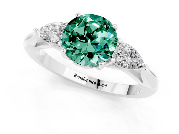 Platinum Three-Stone Round Cut Green Sapphire Ring with Pear  Side Stones in Four-Prong Setting