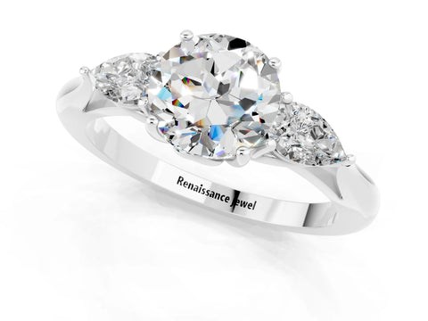 White gold Three-Stone Round Cut Cut Diamond Ring with Pear Side Stones in Four-Prong Setting_1