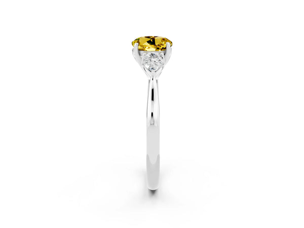 Platinum Three-Stone Round Cut Yellow Sapphire Ring with Pear  Side Stones in Four-Prong Setting
