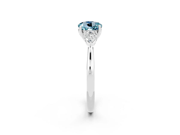 Silver Three-Stone Round Cut Aquamarine Ring with Pear  Side Stones in Four-Prong Setting