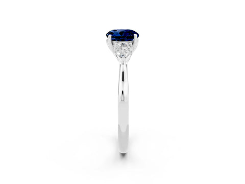 White gold Three-Stone Round Cut Cut Diamond Ring with Pear Side Stones in Four-Prong Setting_2