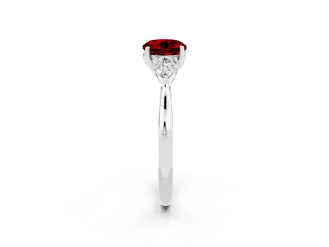 White gold Three-Stone Round Cut Cut Diamond Ring with Pear Side Stones in Four-Prong Setting_2