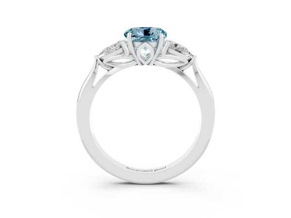 Silver Three-Stone Round Cut Aquamarine Ring with Pear  Side Stones in Four-Prong Setting