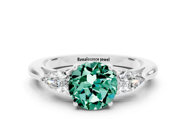 Silver Three-Stone Round Cut Green Sapphire Ring with Pear  Side Stones in Four-Prong Setting
