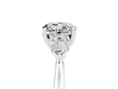 White gold Three-Stone Round Cut Cut Diamond Ring with Pear Side Stones in Four-Prong Setting_5