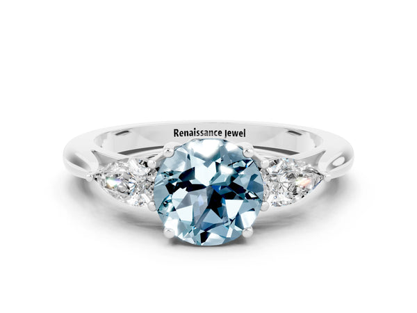 Silver Three-Stone Round Cut Aquamarine Ring with Pear  Side Stones in Four-Prong Setting