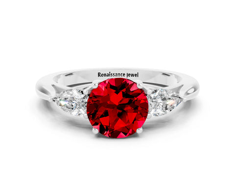 White gold Three-Stone Round Cut Cut Diamond Ring with Pear Side Stones in Four-Prong Setting