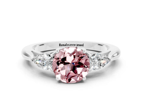 White gold Three-Stone Round Cut Cut Diamond Ring with Pear Side Stones in Four-Prong Setting