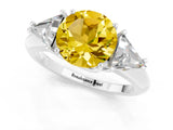 White gold Three-Stone Round Cut Cut Diamond Ring with Trillion Side Stones and Four-Prong Setting_1