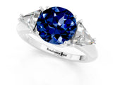 White gold Three-Stone Round Cut Cut Diamond Ring with Trillion Side Stones and Four-Prong Setting_1
