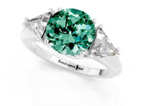 White gold Three-Stone Round Cut Cut Diamond Ring with Trillion Side Stones and Four-Prong Setting_1