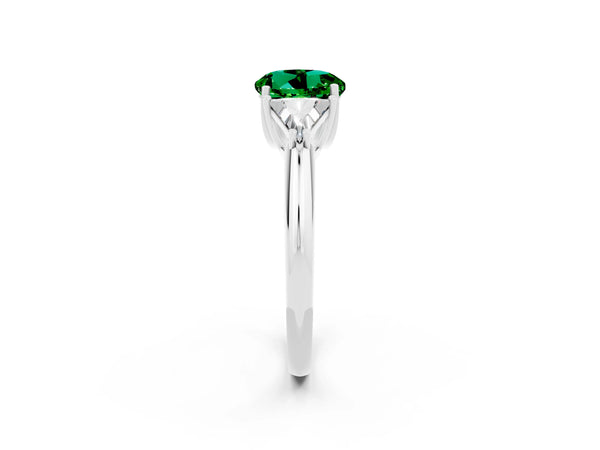 White gold Three-Stone Round Cut Emerald Engagement Ring with Trillion Side Stones and Prong Setting
