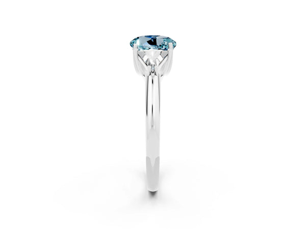 Platinum Three-Stone Round Cut Cut Diamond Ring with Trillion Side Stones and Four-Prong Setting