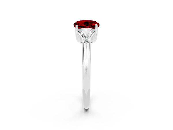Silver Three-Stone Round Cut Ruby Engagement Ring with Trillion Side Stones and Prong Setting
