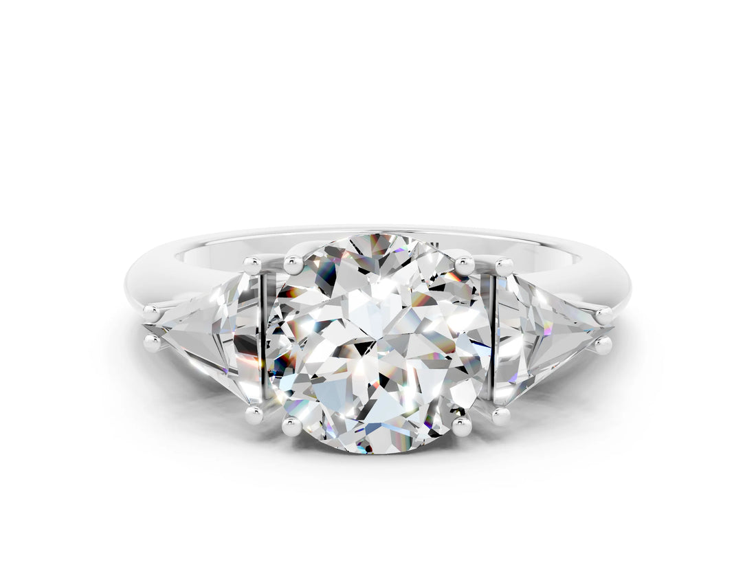 White gold Three-Stone Round Cut Cut Diamond Ring with Trillion Side Stones and Four-Prong Setting