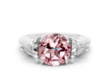 White gold Three-Stone Round Cut Cut Diamond Ring with Trillion Side Stones and Four-Prong Setting