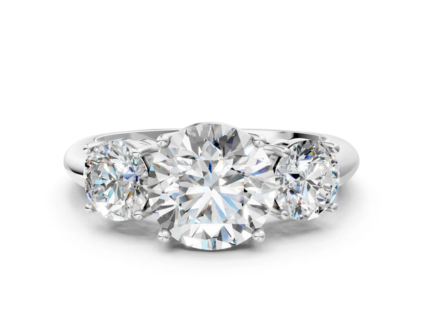 White gold Three-Stone Round Cut Diamond Engagement Ring with Prong Setting on a White Gold Band
